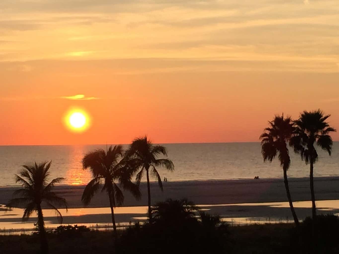 Marco Island Beachfront Properties with a Sunset
